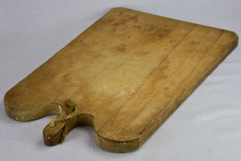 Very large antique French cutting board with round shoulders and handle 25¼" x 16½"