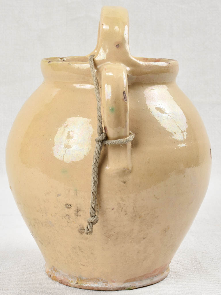 Pale yellow lidded water pitcher, 19th century 11½"