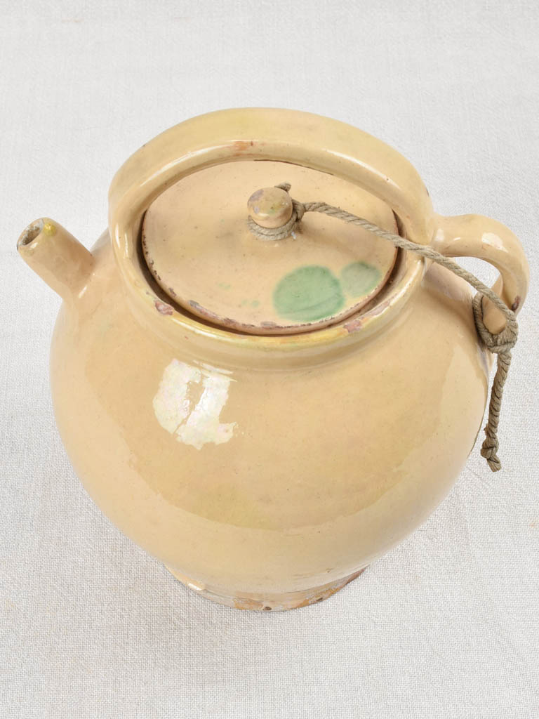 Pale yellow lidded water pitcher, 19th century 11½"