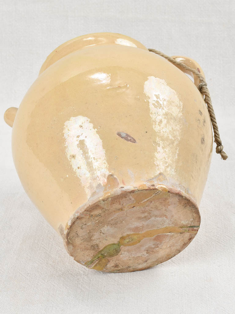 Pale yellow lidded water pitcher, 19th century 11½"