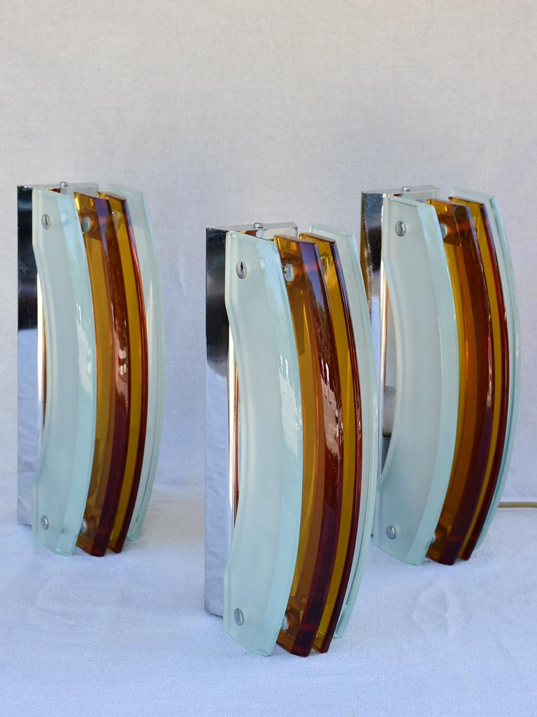 Set of three amber and pale blue glass wall sconces from the 1970's 13"