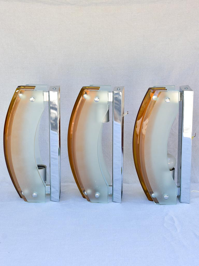 Set of three amber and pale blue glass wall sconces from the 1970's 13"