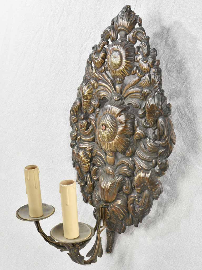 Vintage sunflower-decorated brass sconces