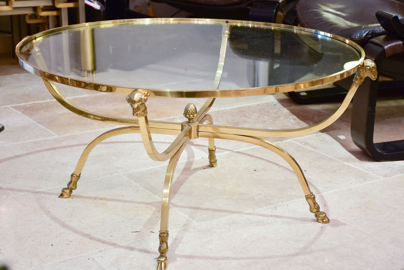 Round vintage Italian coffee table with ram's heads