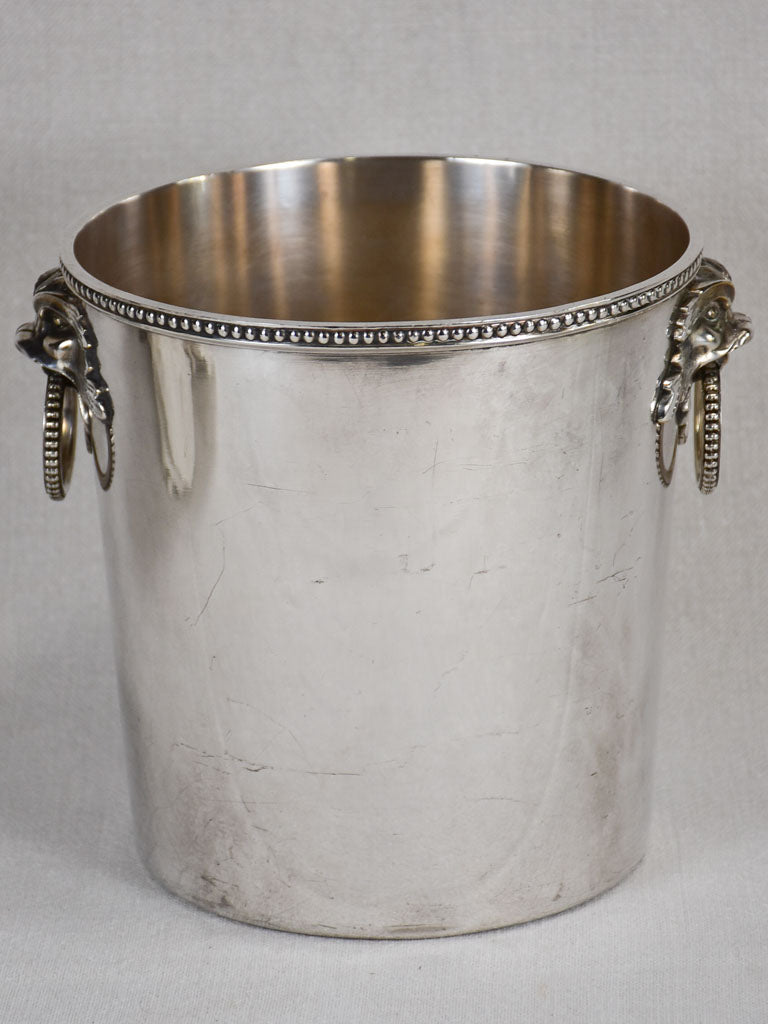 Early 20th-century ice bucket with lions' heads handles