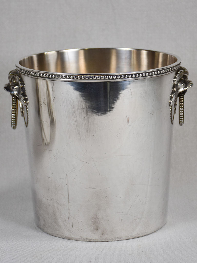 Early 20th-century ice bucket with lions' heads handles