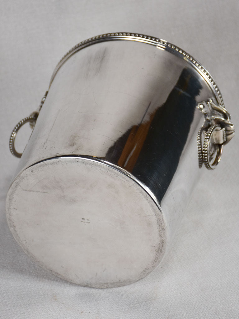 Early 20th-century ice bucket with lions' heads handles