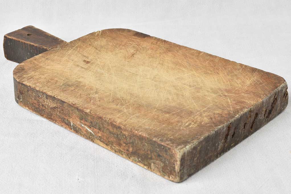 Antique French cutting board with rounded shoulders 17" x 9"