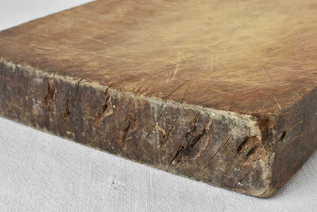 Antique French cutting board with rounded shoulders 17" x 9"