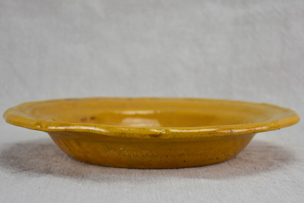 Set of seven mid century bowls with orange glaze 9½"