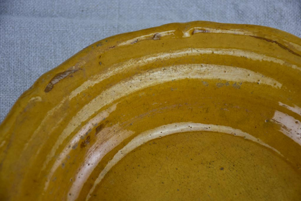 Set of seven mid century bowls with orange glaze 9½"