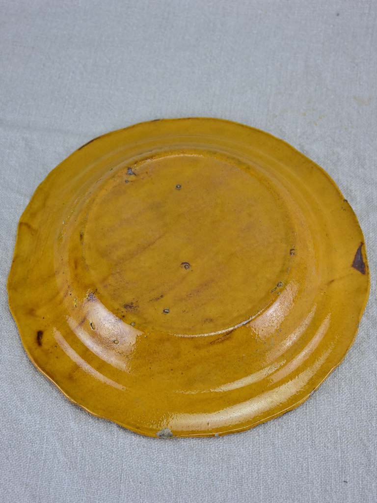 Set of seven mid century bowls with orange glaze 9½"