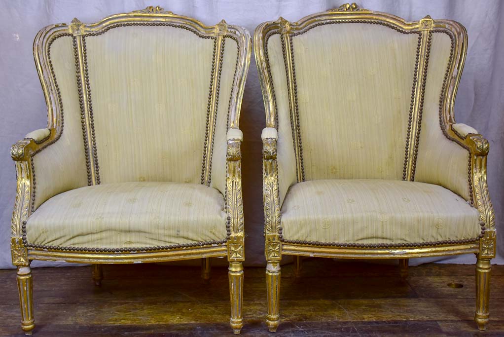 Pair of antique Louis XVI gilded armchairs