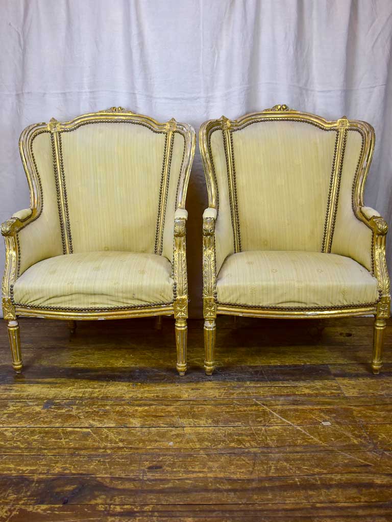 Pair of antique Louis XVI gilded armchairs