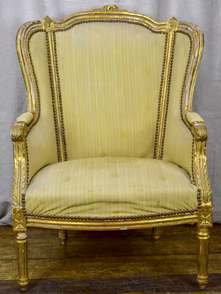 Pair of antique Louis XVI gilded armchairs