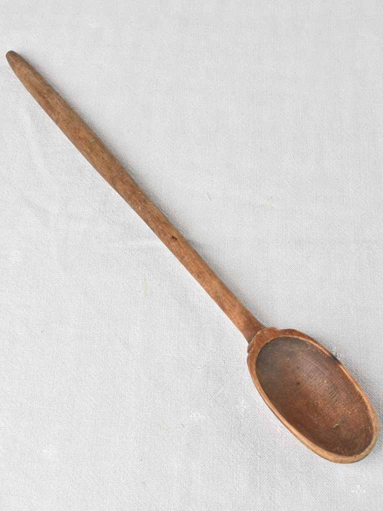 19th century wooden spoon 20"