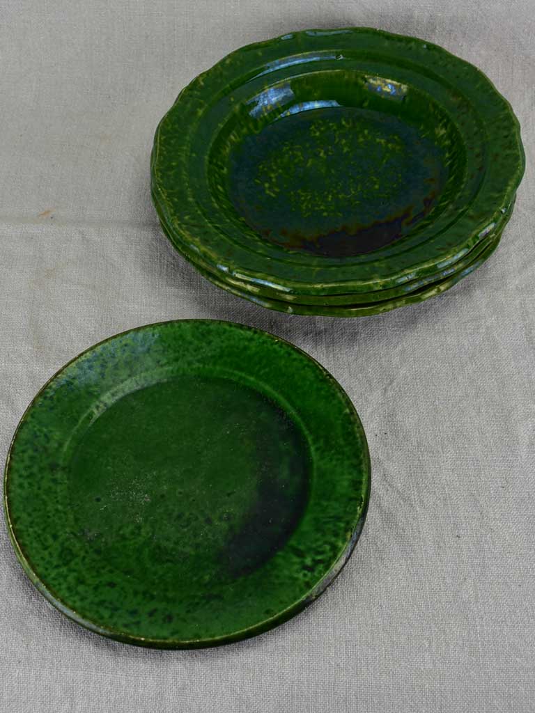 Collection of three early twentieth century green bowls and one green plate