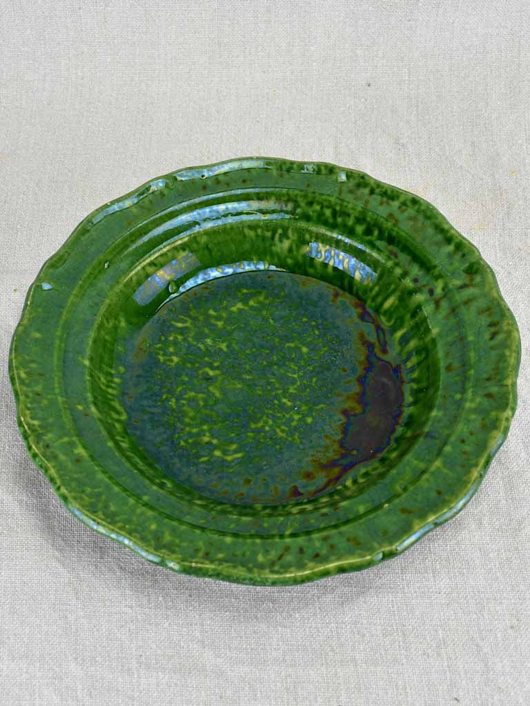 Collection of three early twentieth century green bowls and one green plate