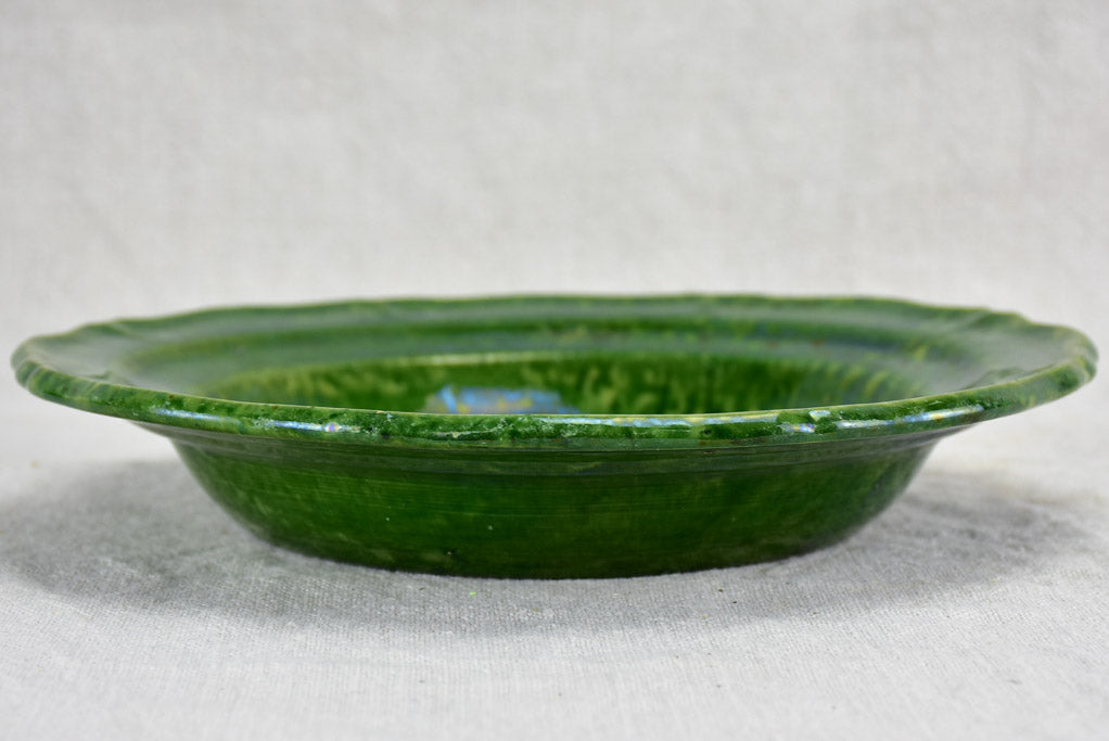 Collection of three early twentieth century green bowls and one green plate