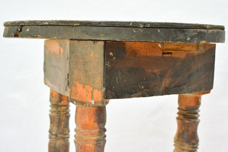 Small antique wooden side table with three legs