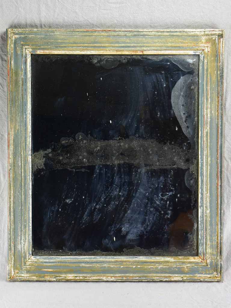 19th-century French mirror with timeworn glass and patinated timber frame 23¾" x 27½"