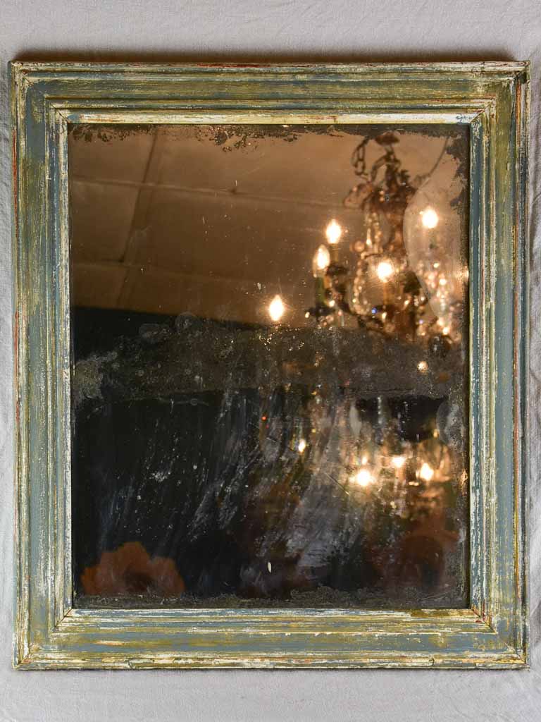 19th-century French mirror with timeworn glass and patinated timber frame 23¾" x 27½"