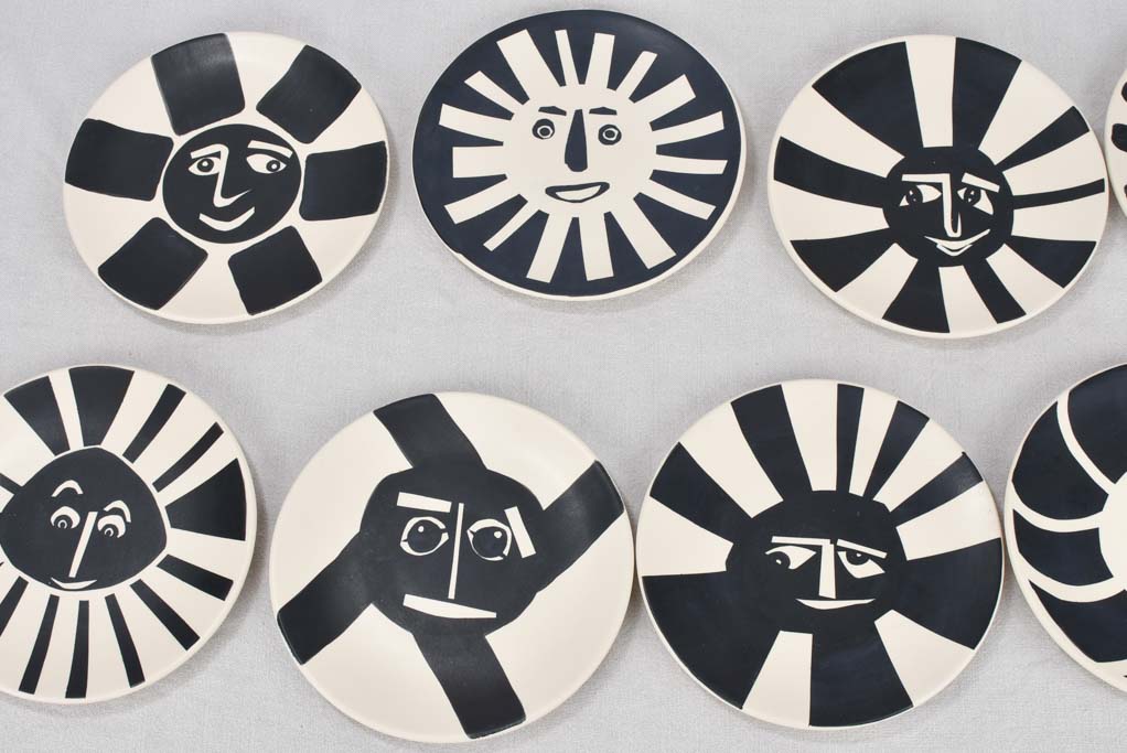 12 plates, beige & black, abstract faces 9"