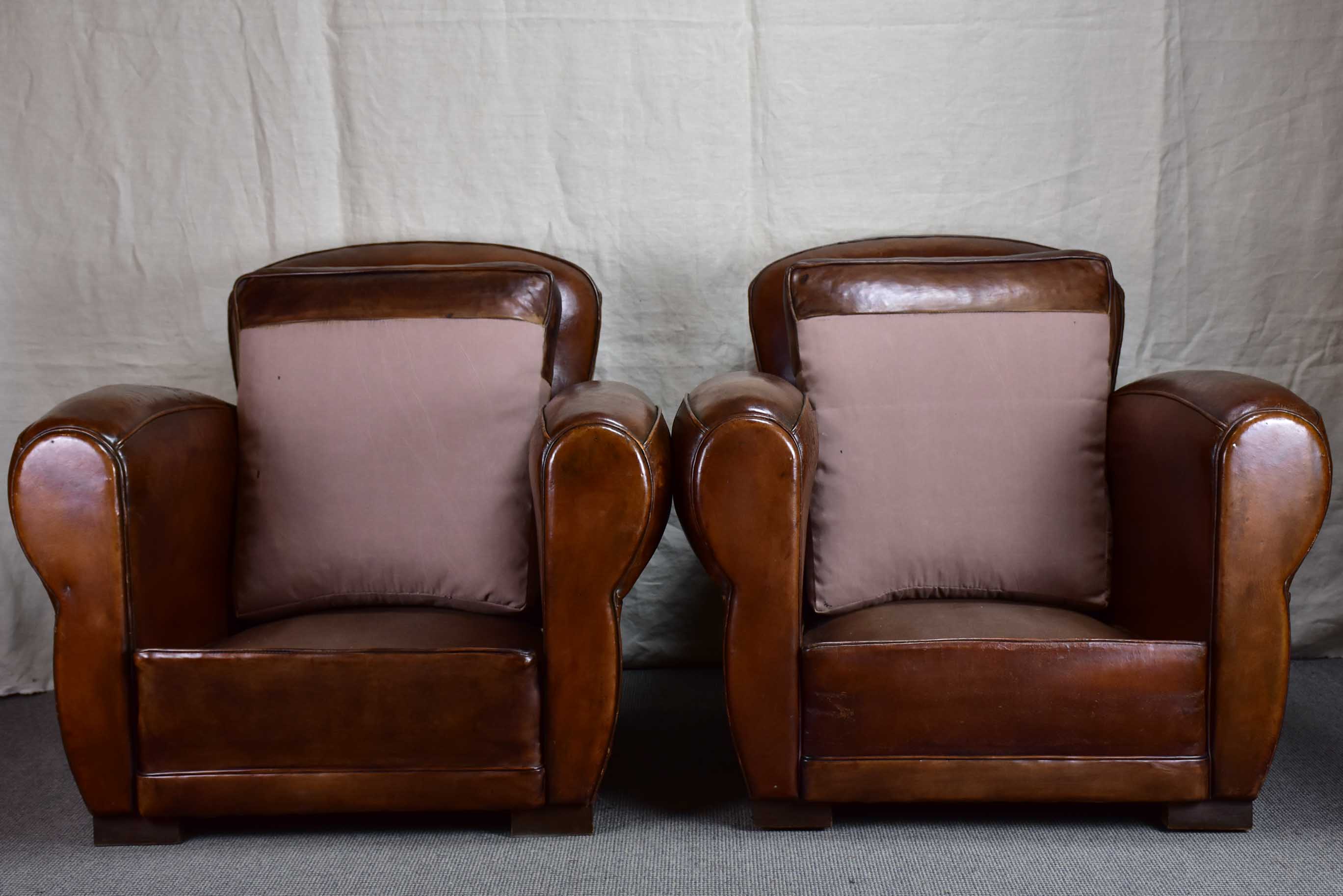 Pair of French leather club chairs from the 1950's