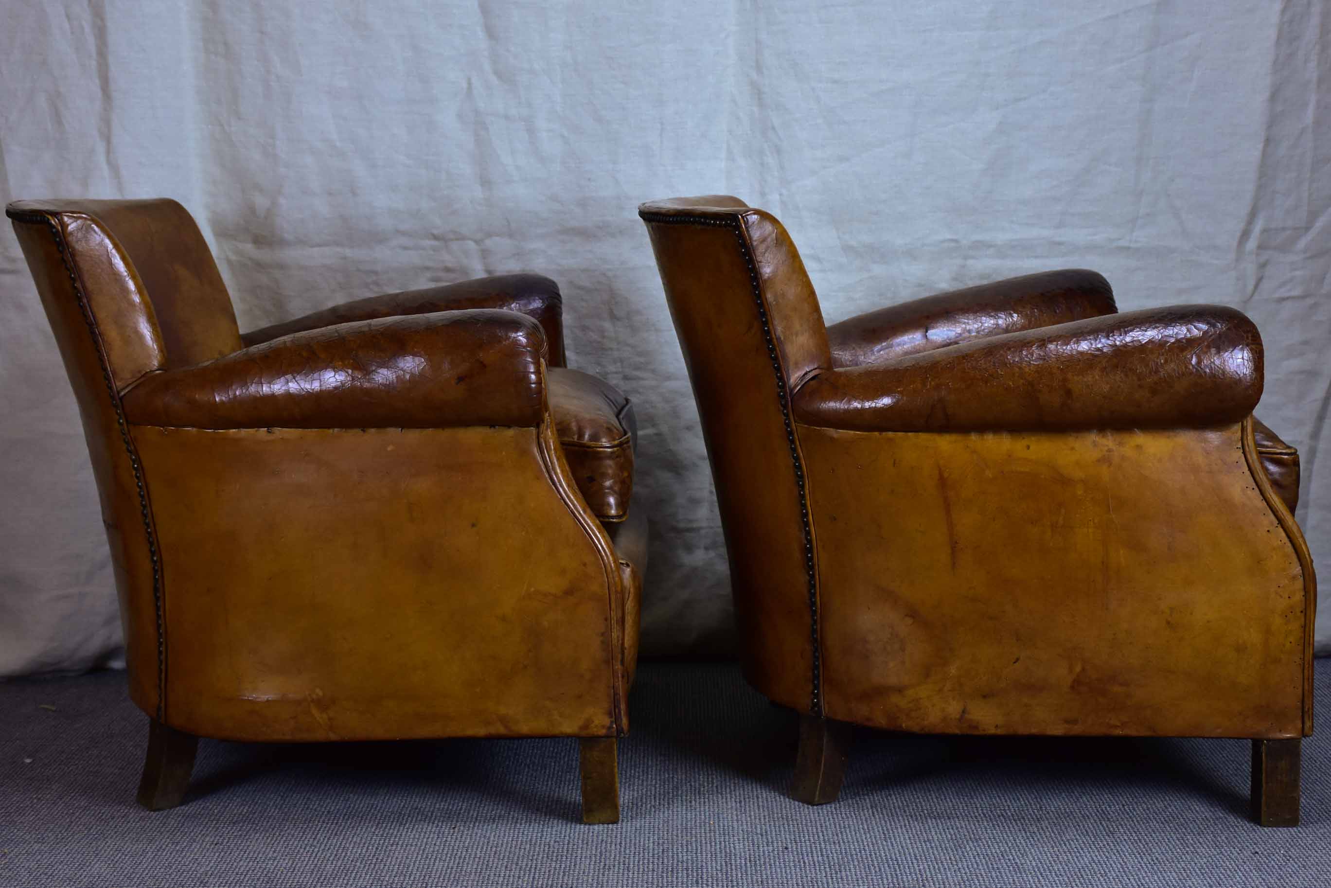 Pair of petite French leather club chairs - 1930's