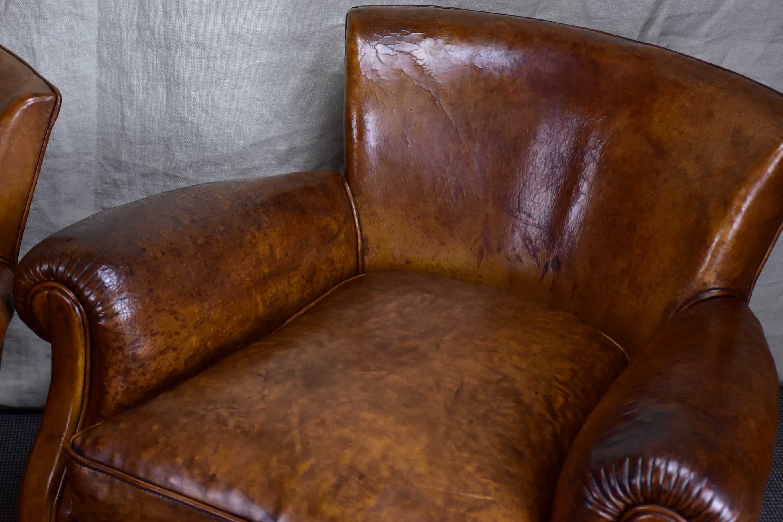 Pair of petite French leather club chairs - 1930's