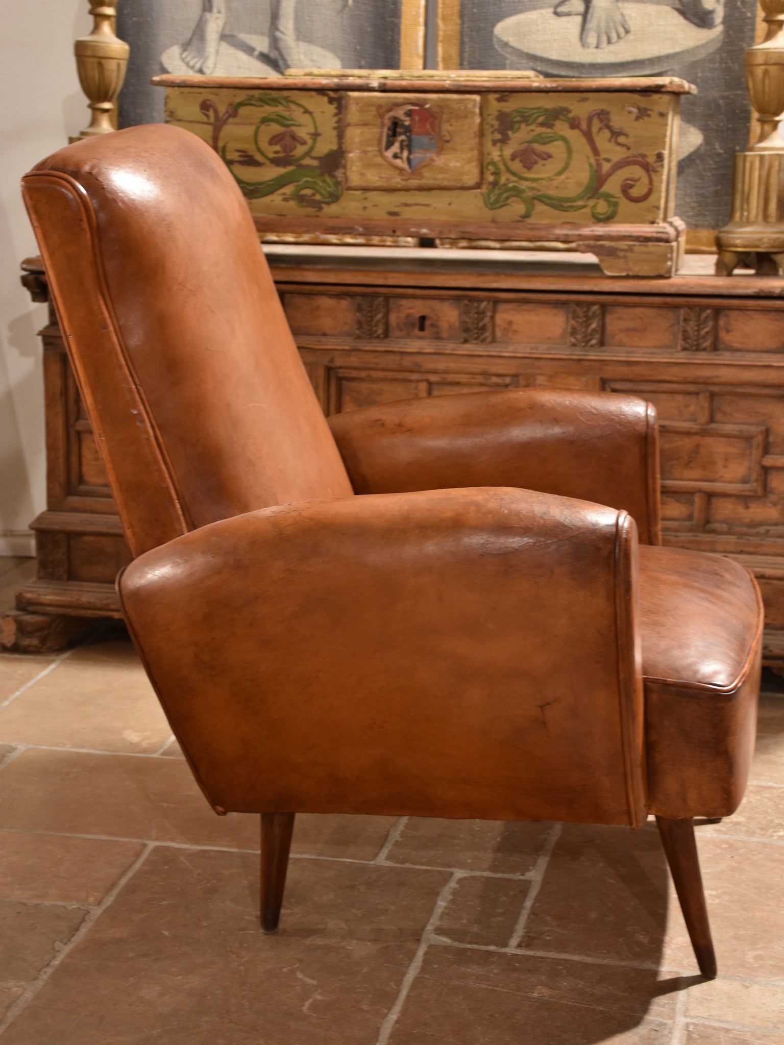 French leather club chair – 1960’s with tapered legs