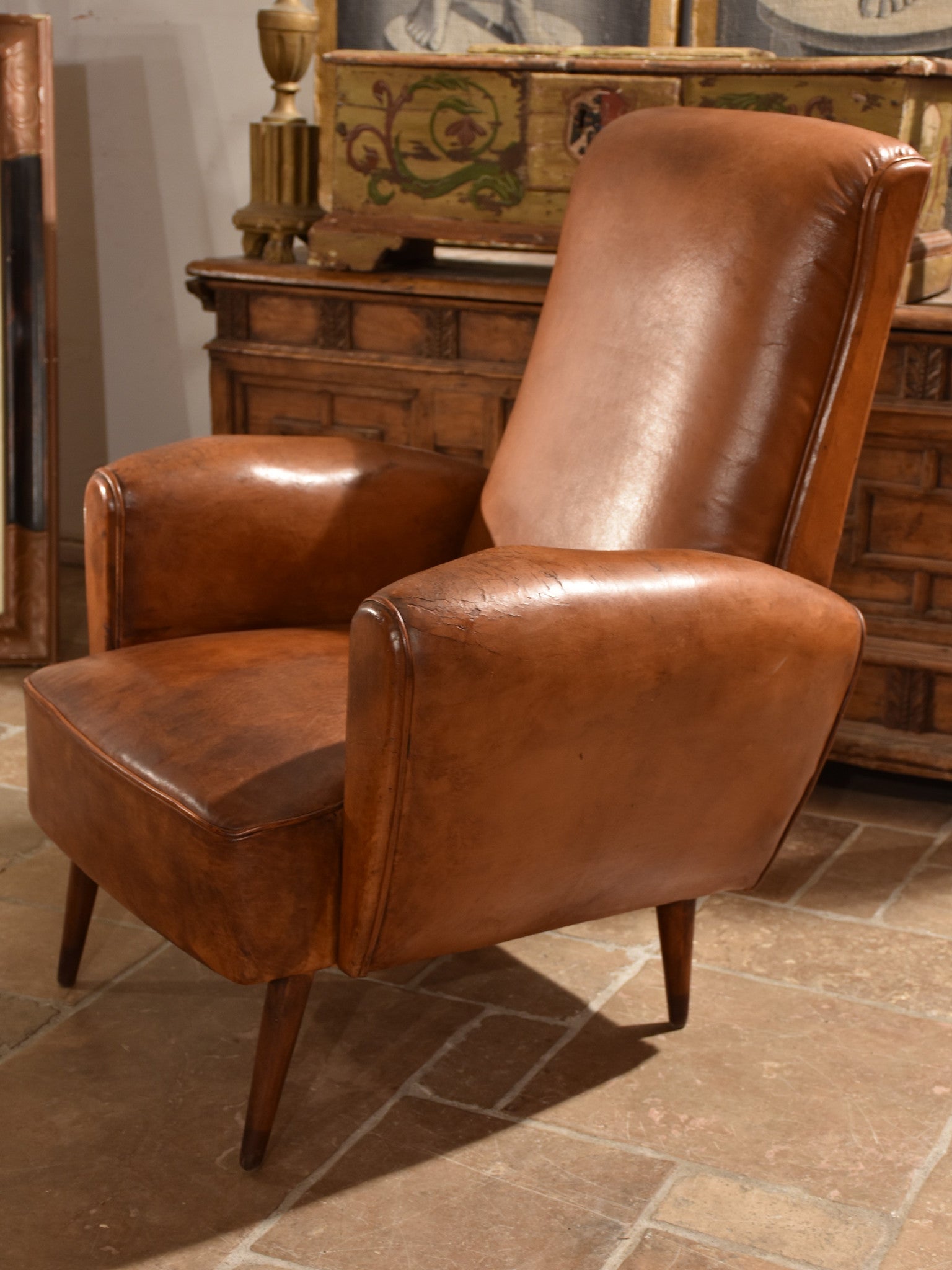 French leather club chair – 1960’s with tapered legs