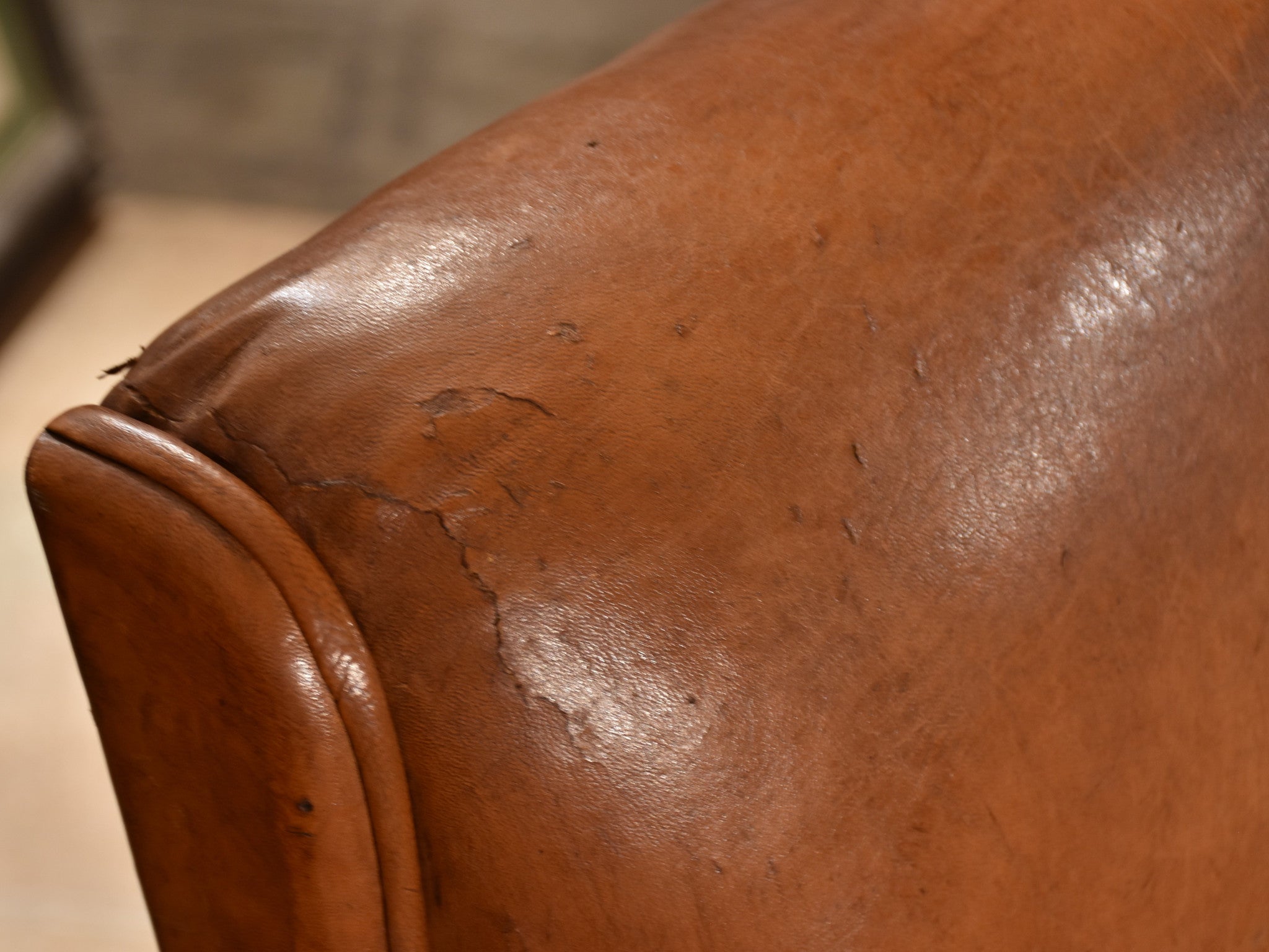 French leather club chair – 1960’s with tapered legs