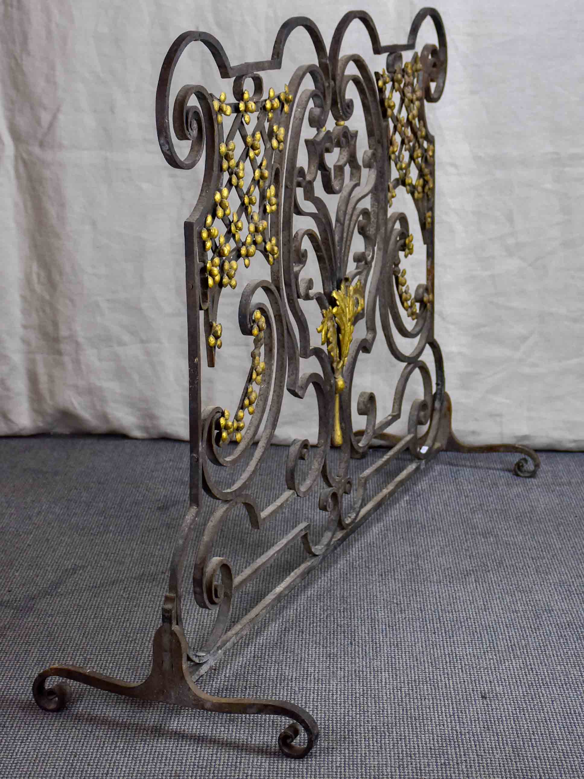 Wrought iron fire screen with flowers