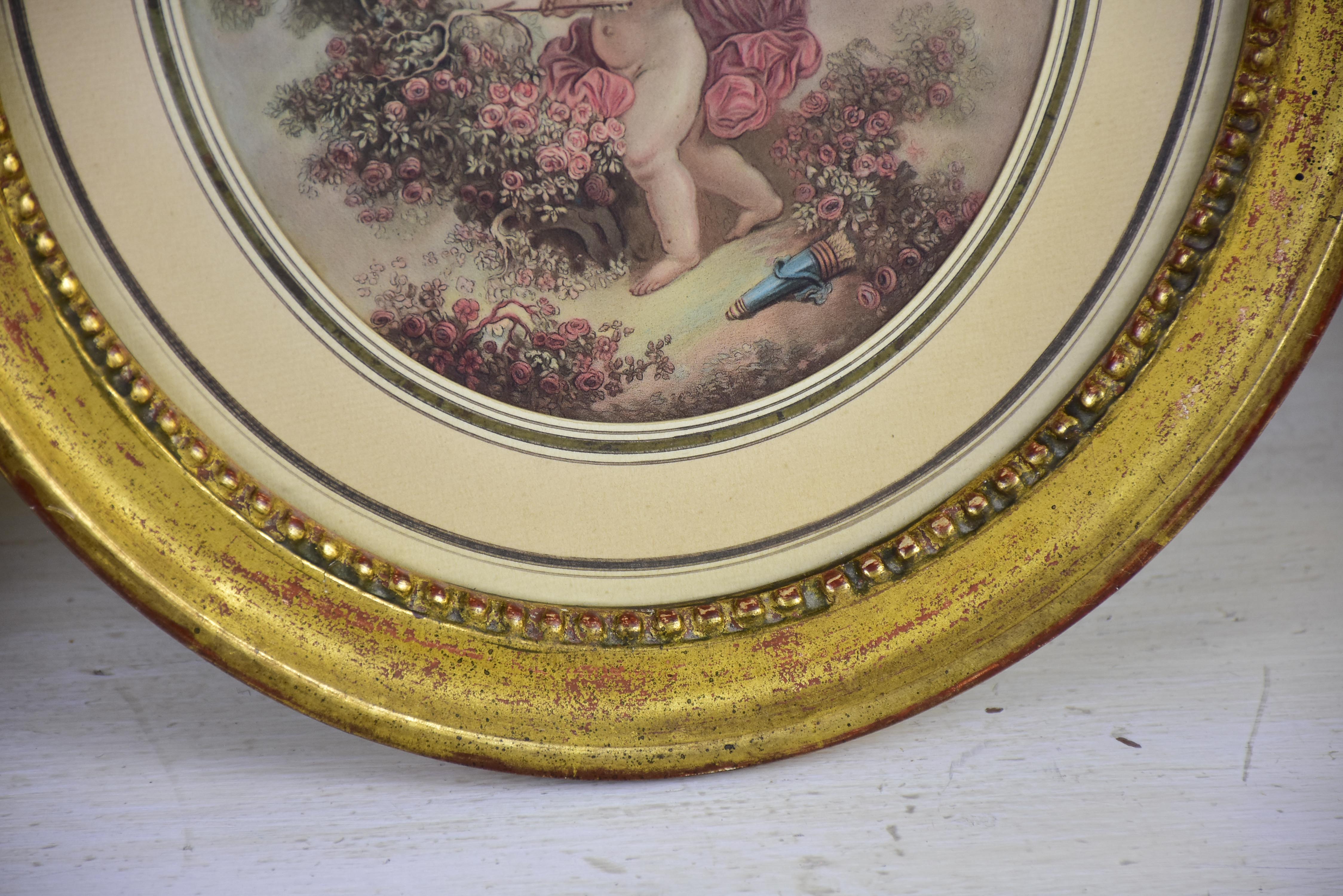 A pair of 19th century French paintings in oval frames