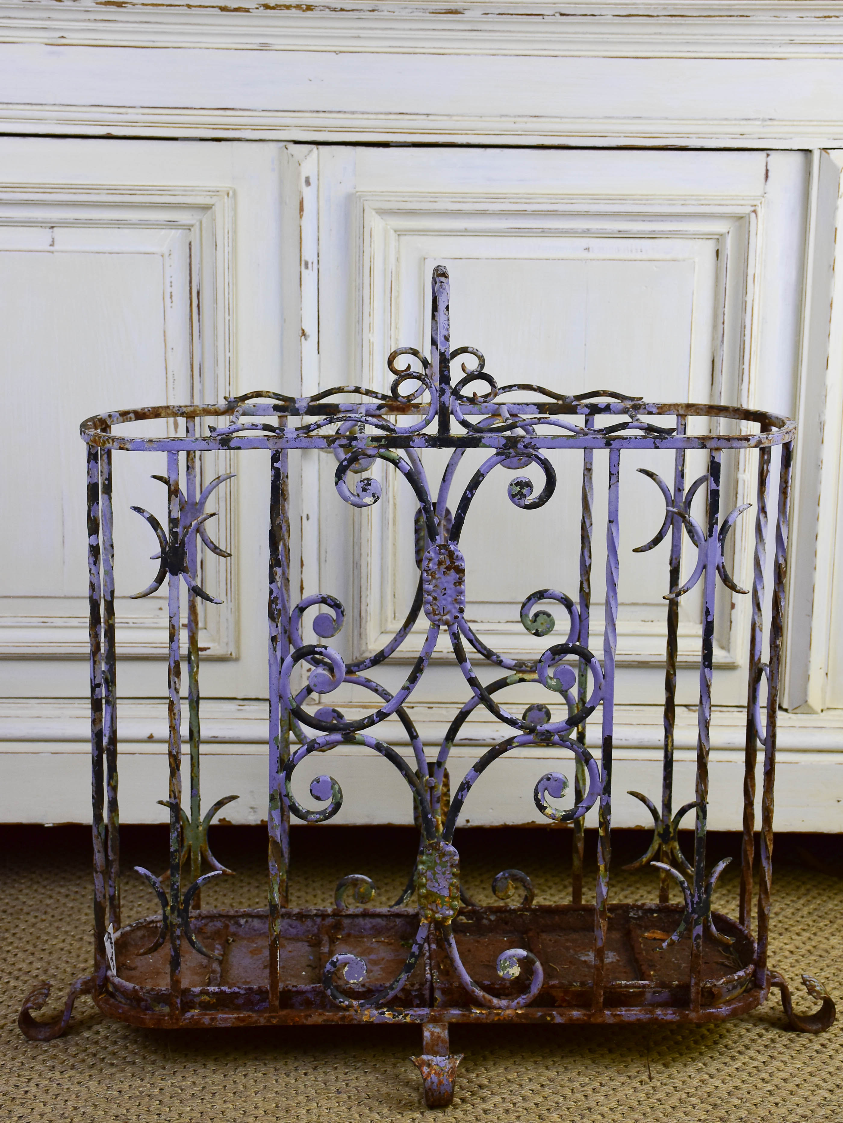 Antique wrought iron umbrella stand