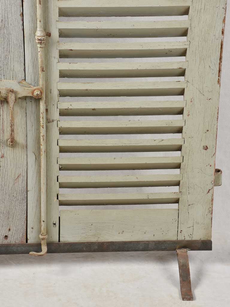 Pair of 19th century French oak shutters on stand 74¾" x 44"