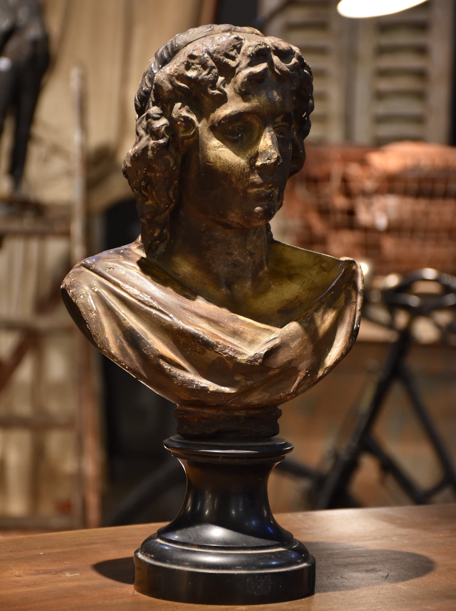 Antique bust mounted on black marble base – 19th century