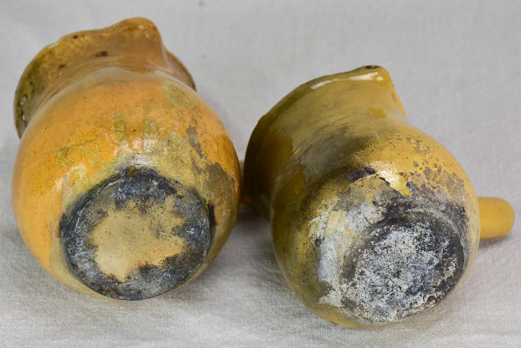 Two small antique French sauce pitchers with side handles