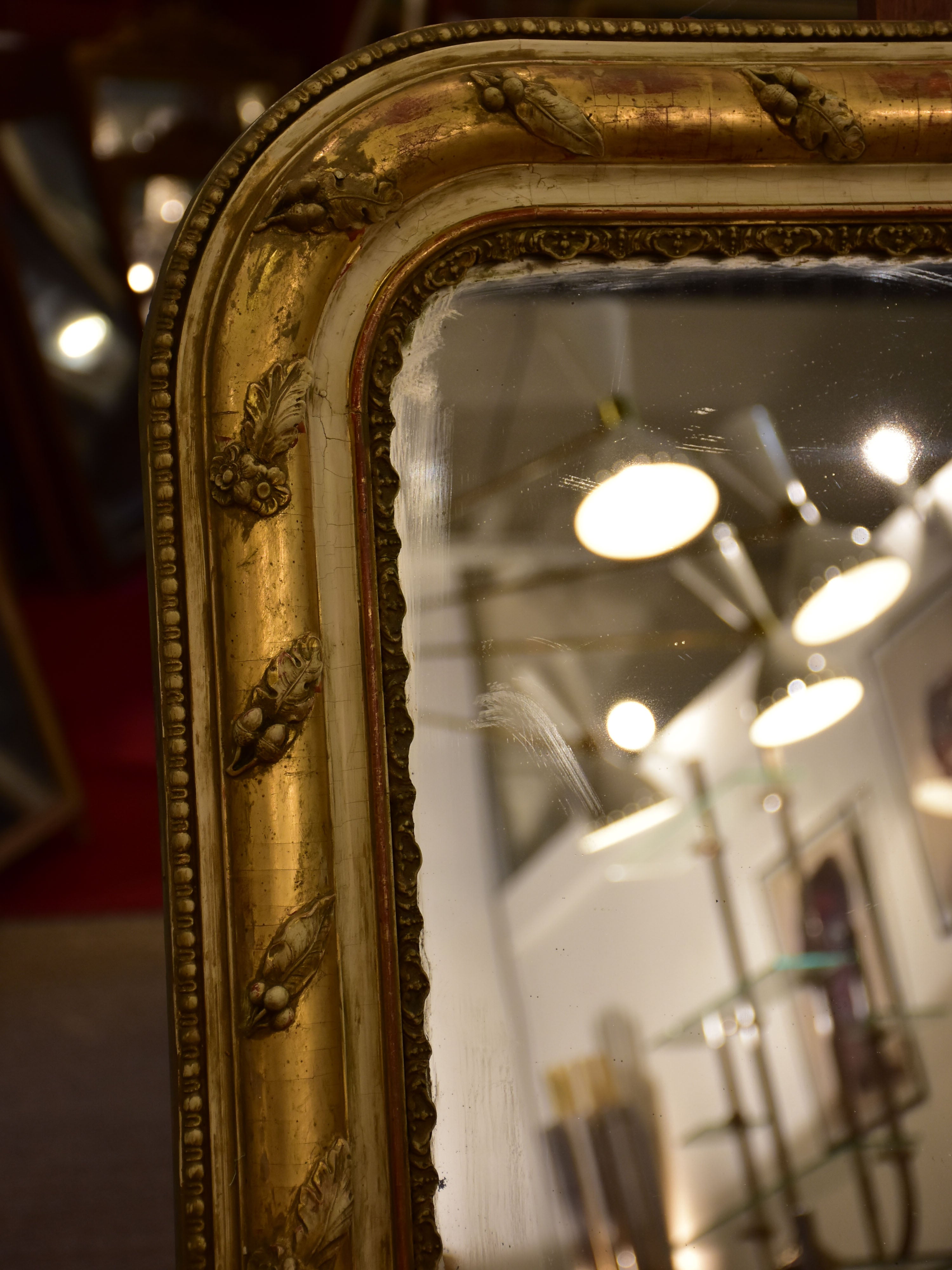 19th century Louis Philippe mirror with foliage decoration