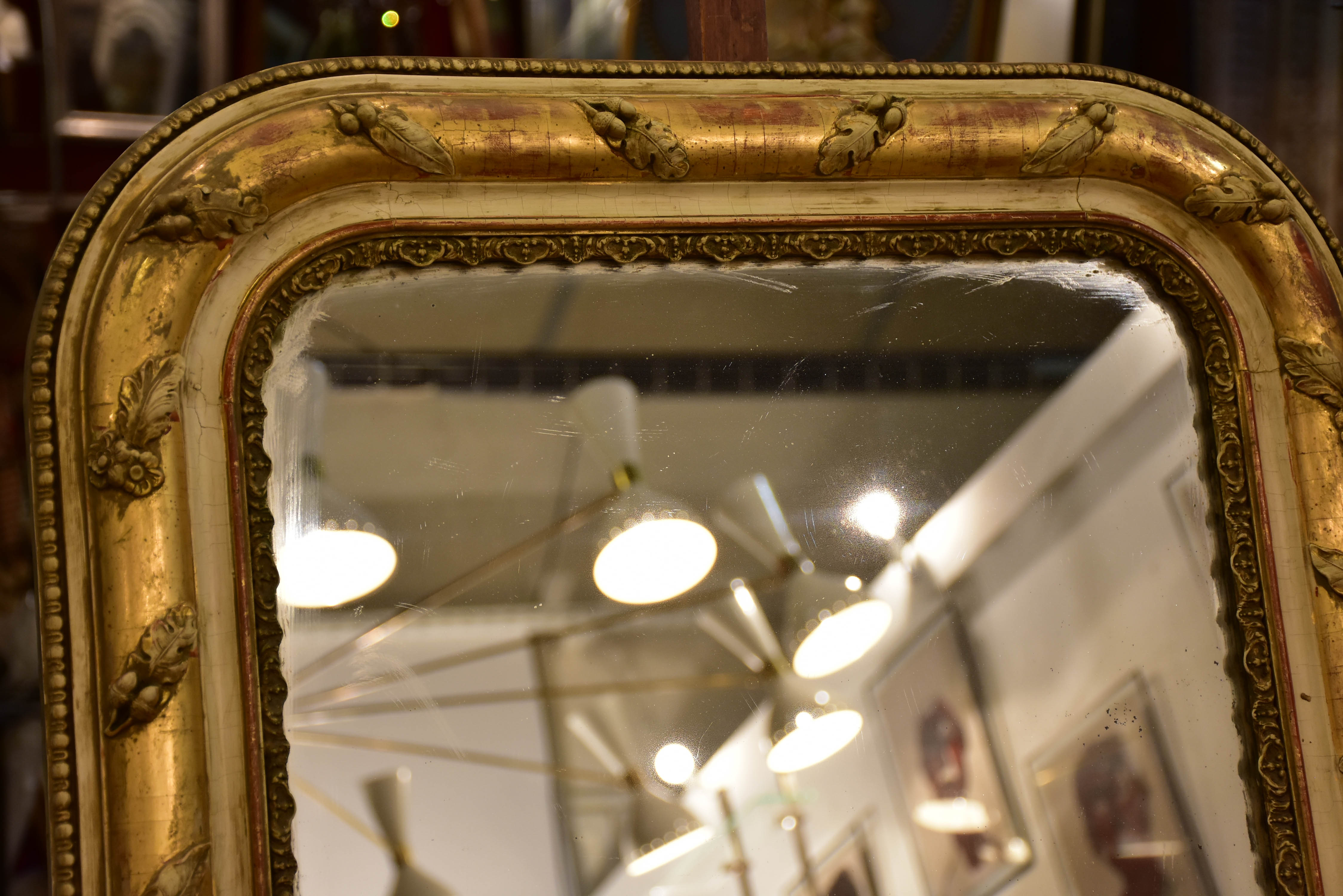 19th century Louis Philippe mirror with foliage decoration