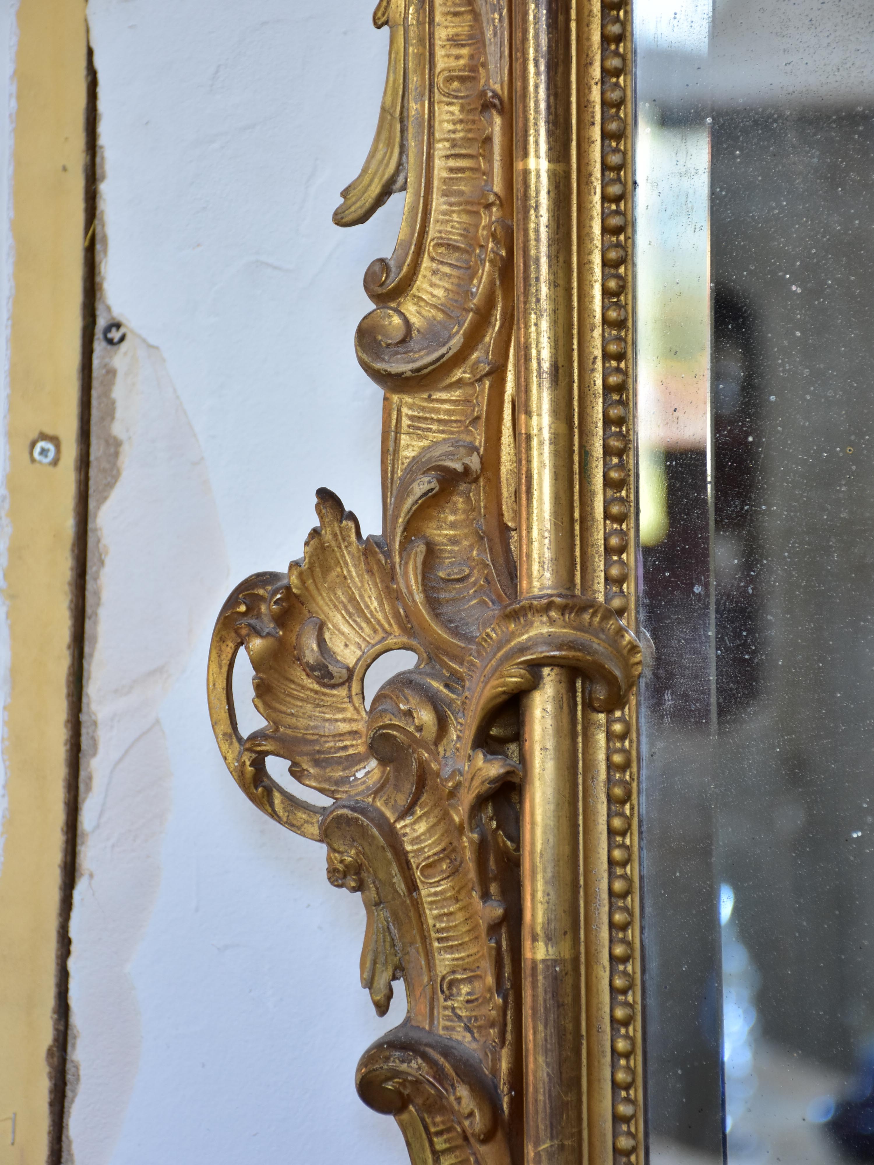 19th century Napoleon III gilded mirror with decorative crest