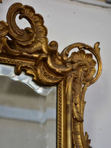 19th century Napoleon III gilded mirror with decorative crest