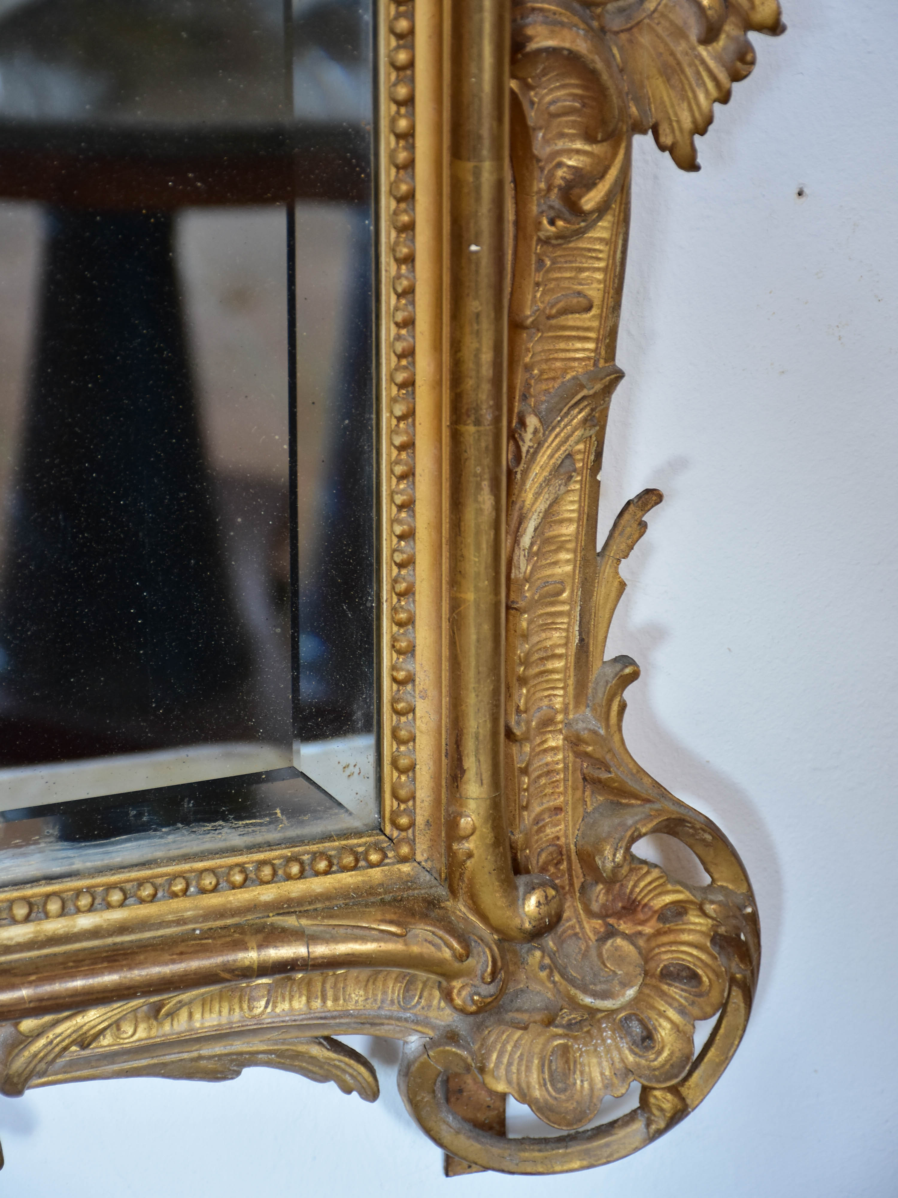 19th century Napoleon III gilded mirror with decorative crest