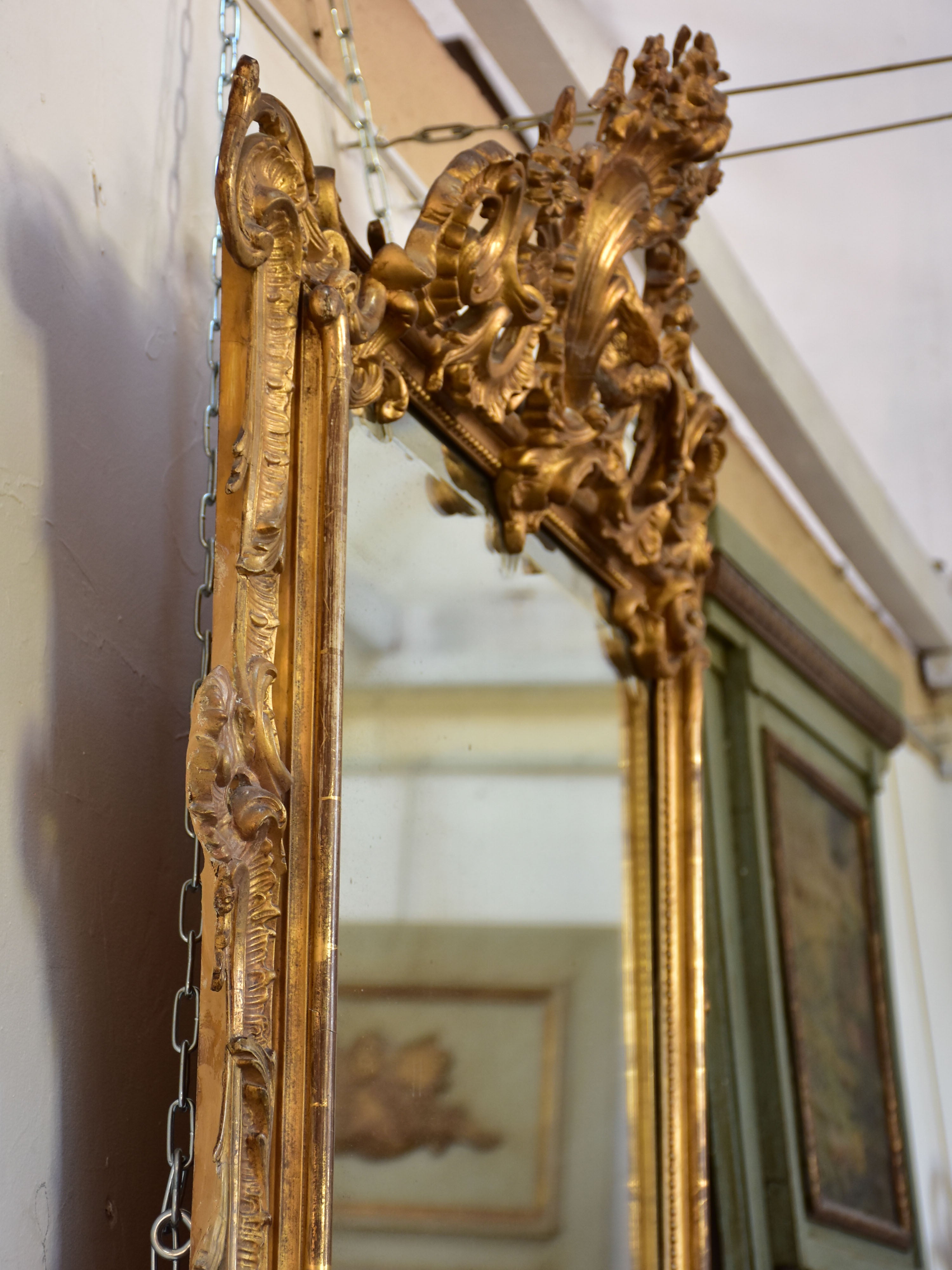 19th century Napoleon III gilded mirror with decorative crest