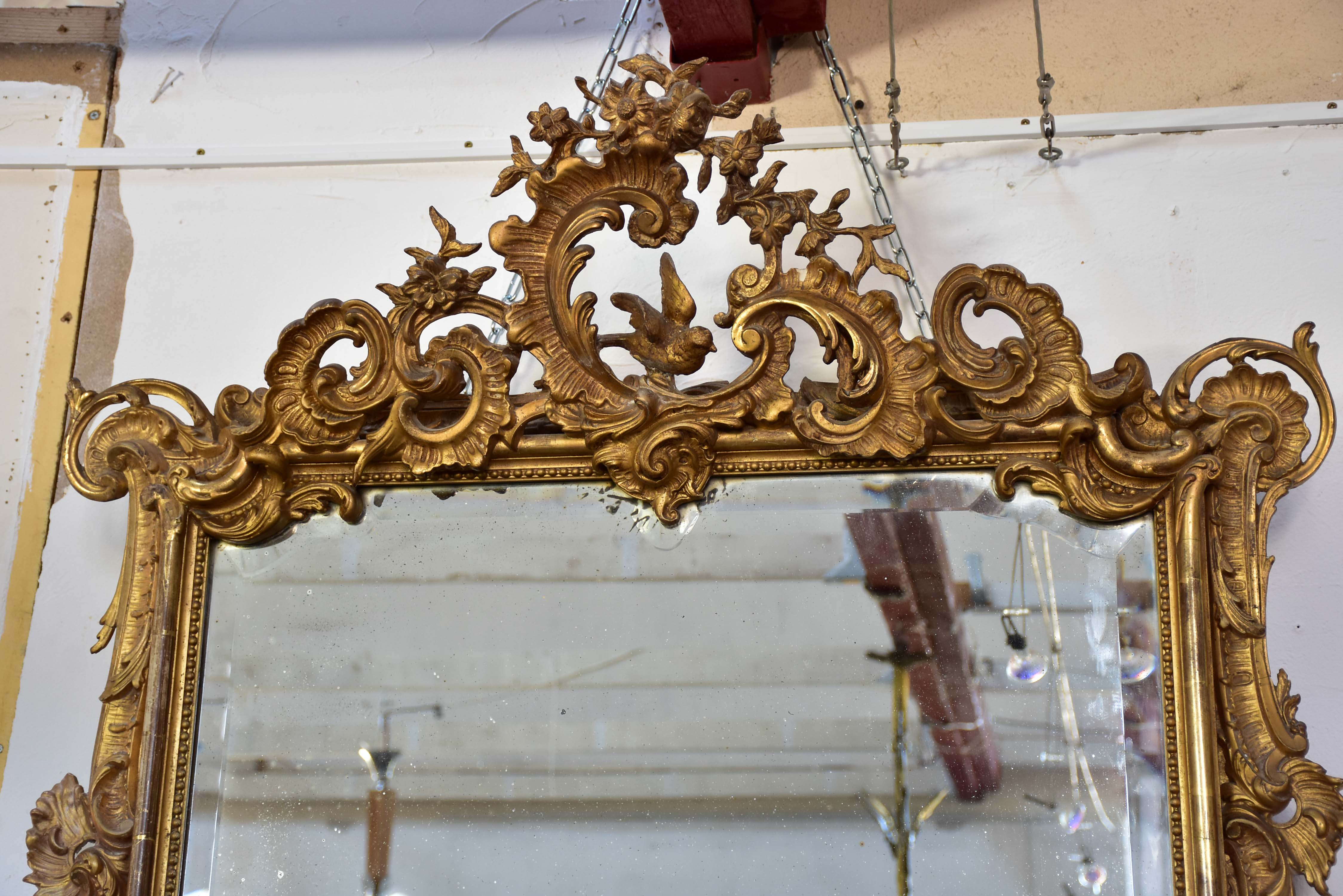 19th century Napoleon III gilded mirror with decorative crest