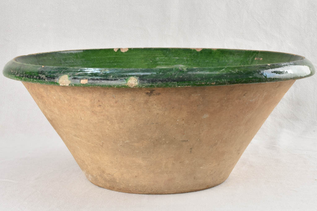 Very large Provencal tian bowl with green glaze and old repairs 24¾"