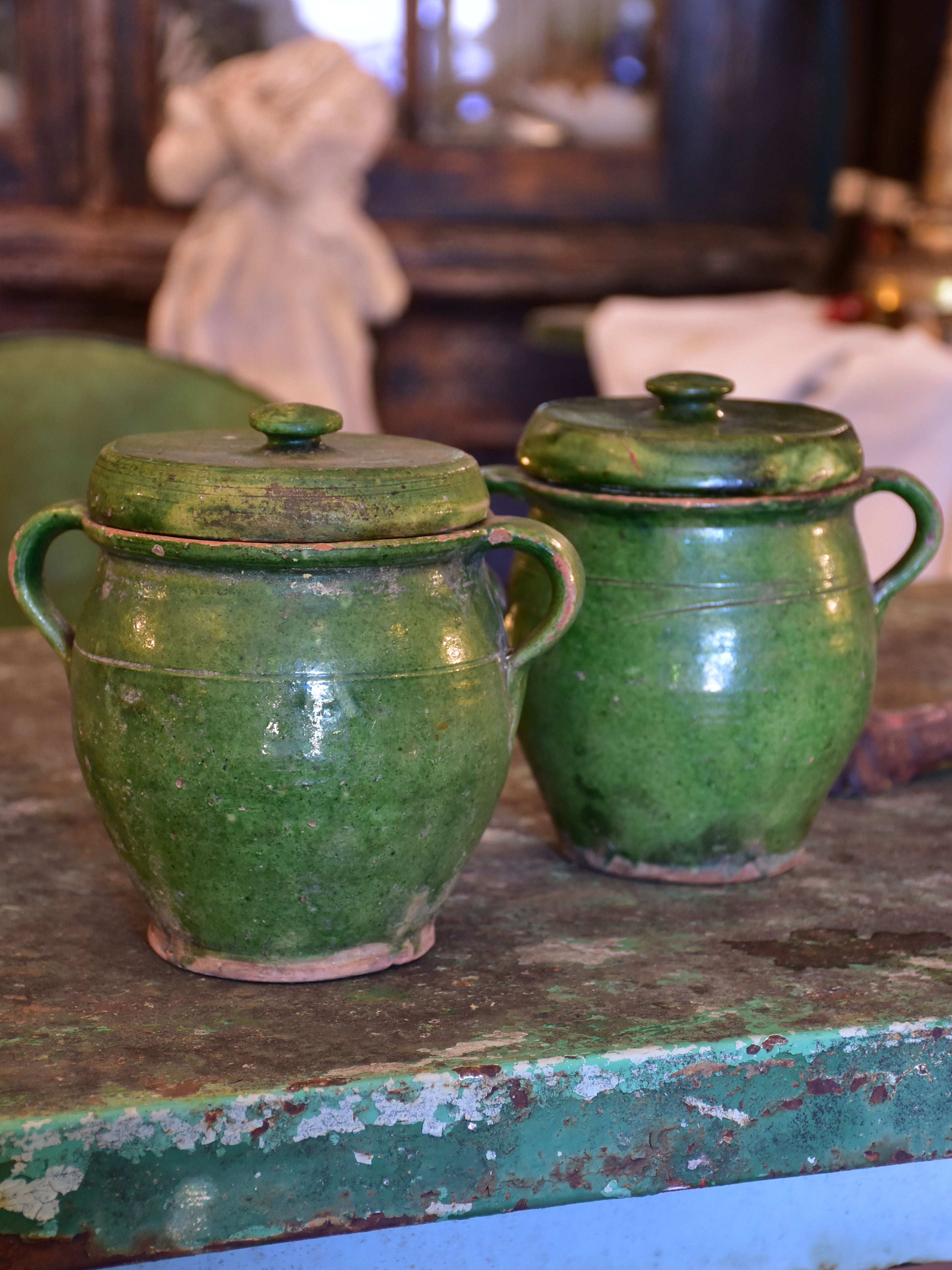 Pair of green glazed French preserving jars with lids