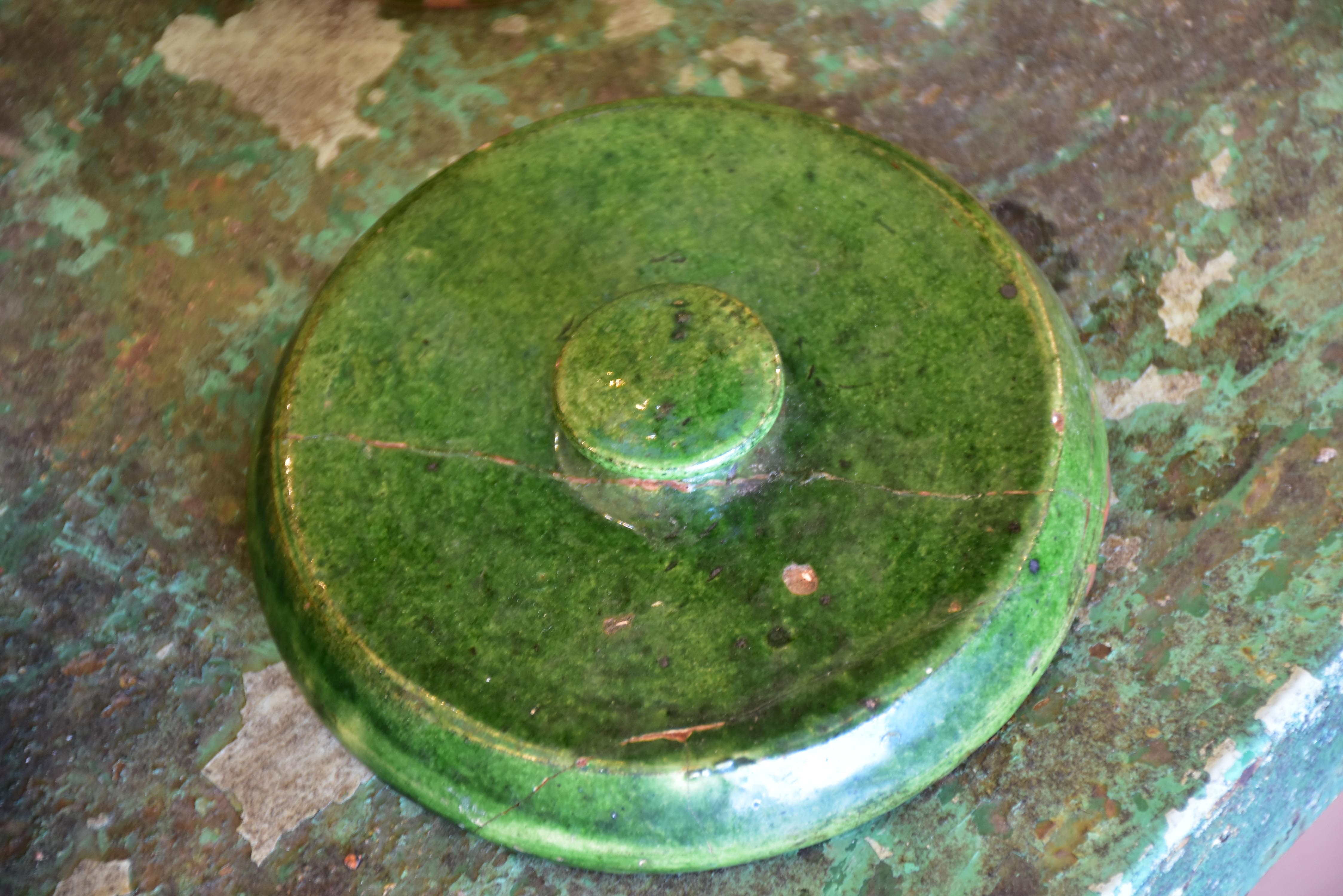 Pair of green glazed French preserving jars with lids