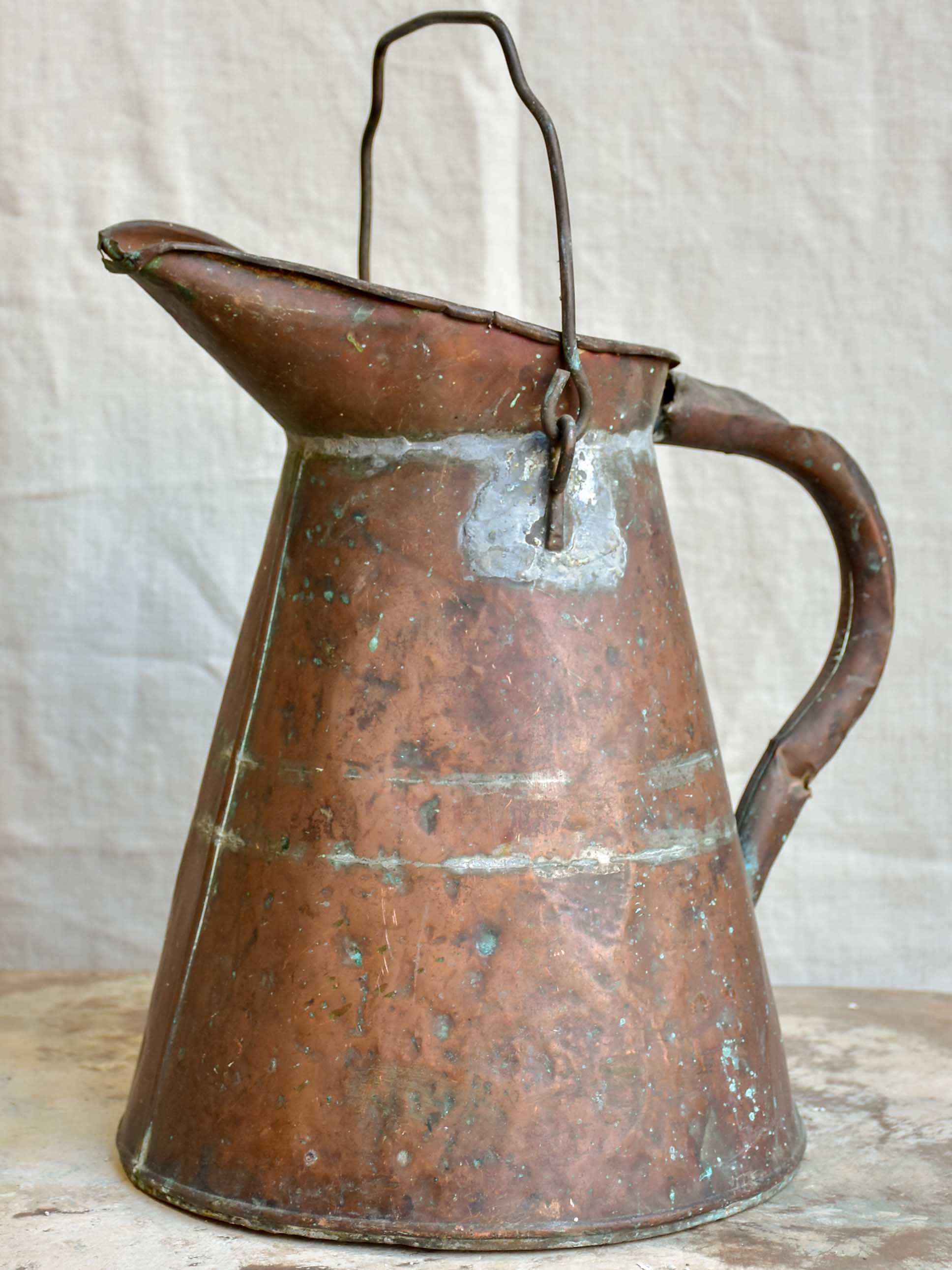 Rustic antique French copper watering can